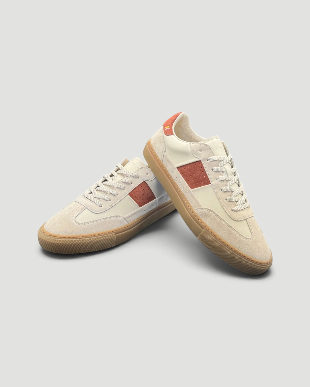 Errant Lux Court Sneaker Grand Tour edition in off-white leather and suede with reddish-brown panels and gum sole.