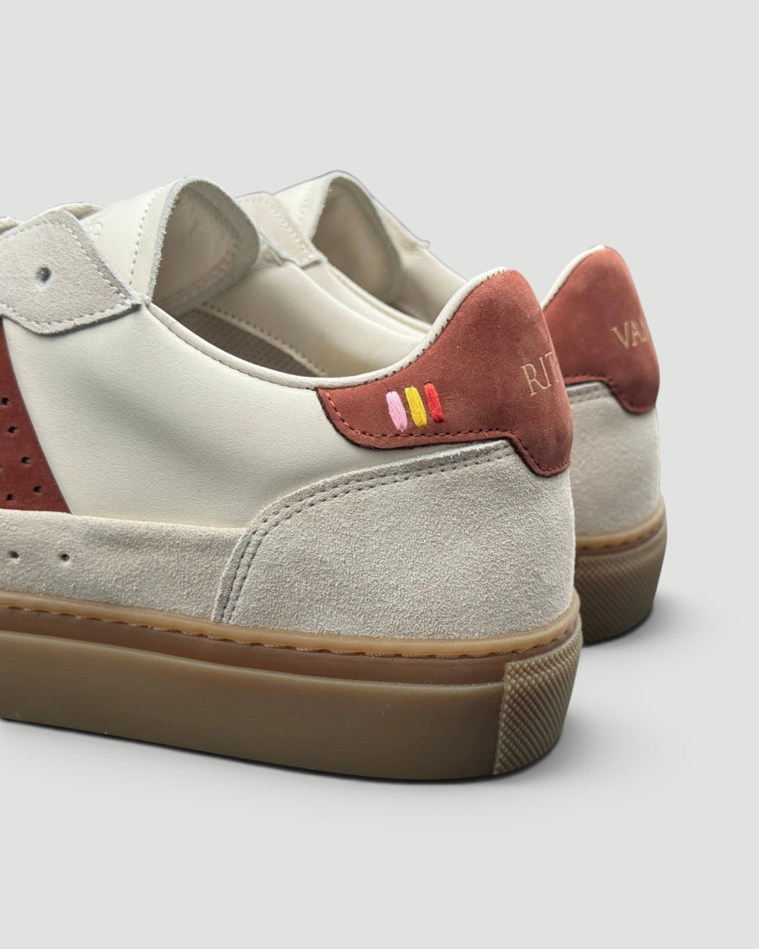 Errant Lux Court Sneaker Grand Tour Edition in off-white leather and suede with reddish-brown panels and gum sole.