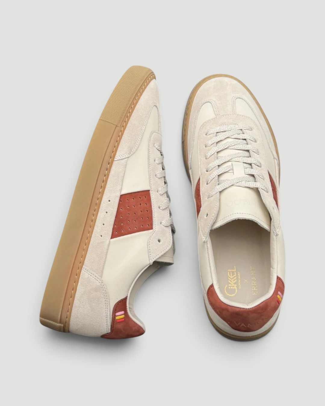 Errant Lux Court Sneaker in off-white leather and suede with reddish-brown panels and a classic gum rubber sole.