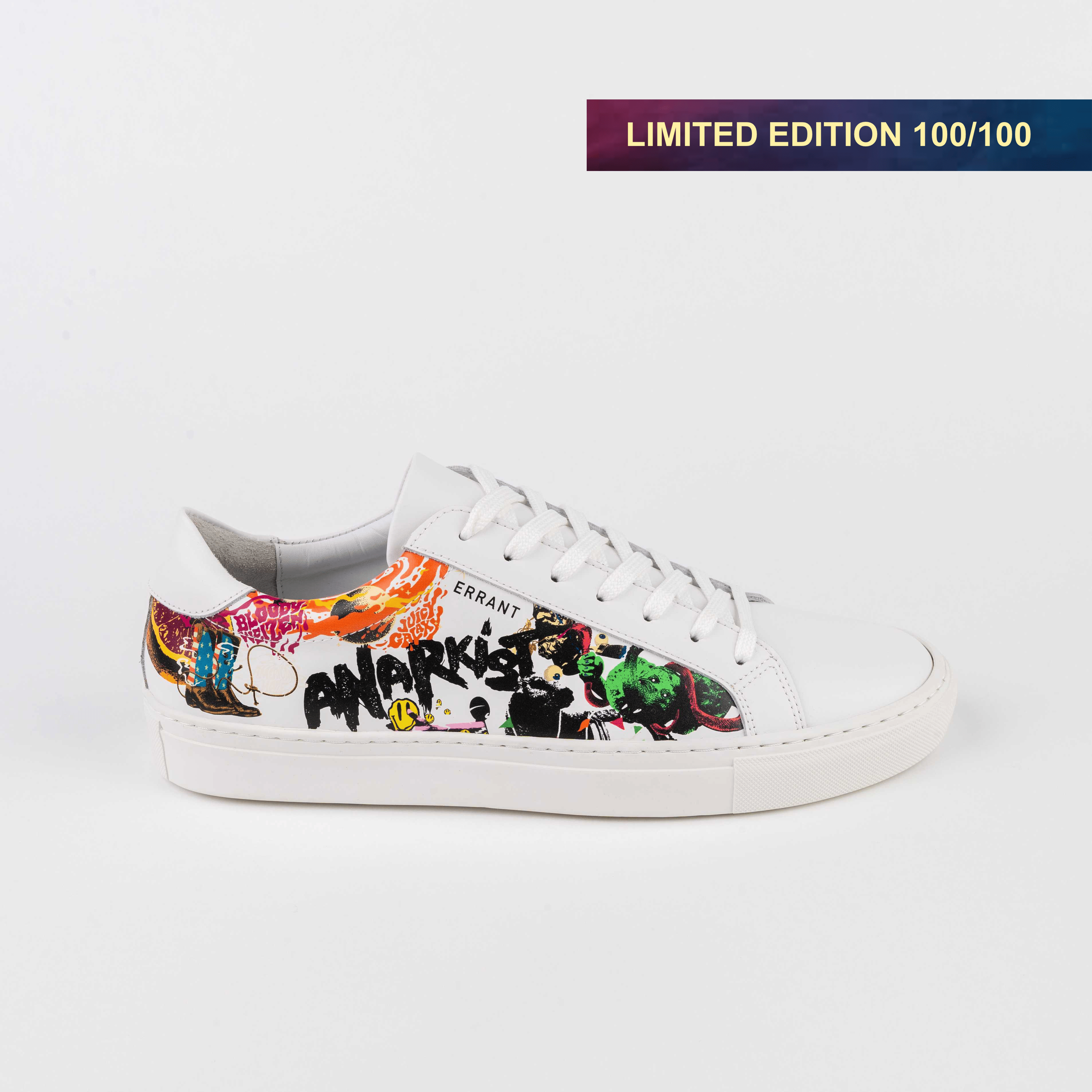Billedet viser en hvid sneaker med farverigt graffiti-design og teksten "Anarkist". Skoen er en begrænset udgave, nummer 100 ud af 100.